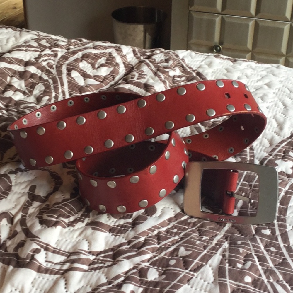 CK red leather studded belt